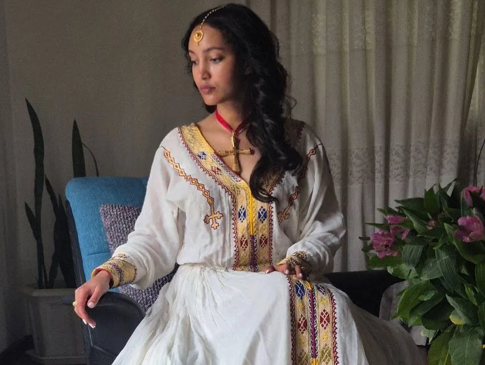 Simple Cross-Stitched Habesha Dress: with Multicolor Ornaments Traditional Ethiopian Dress