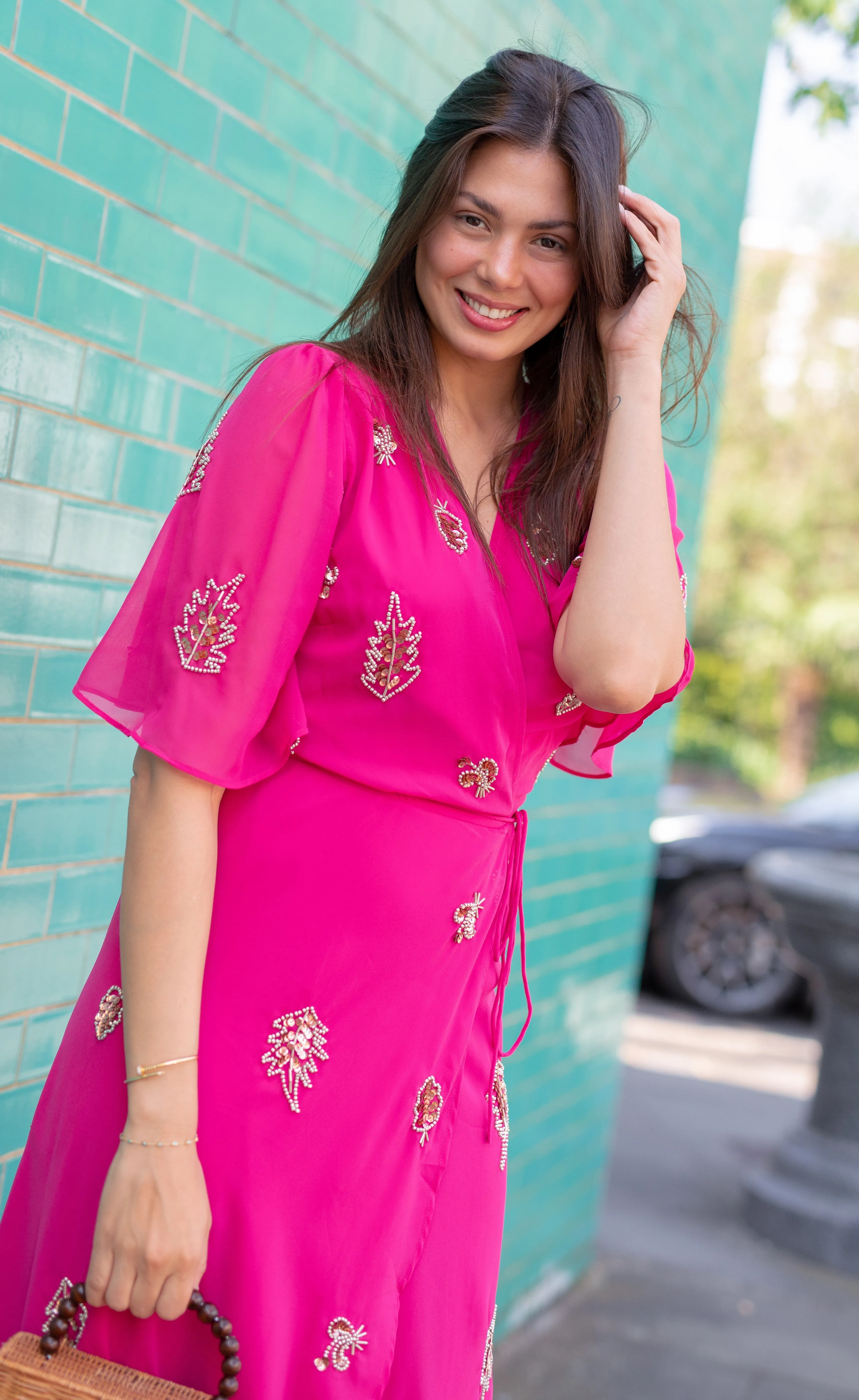 THE MOLLY EMBELLISHED FLUTTER SLEEVE WRAP DRESS (PINK)