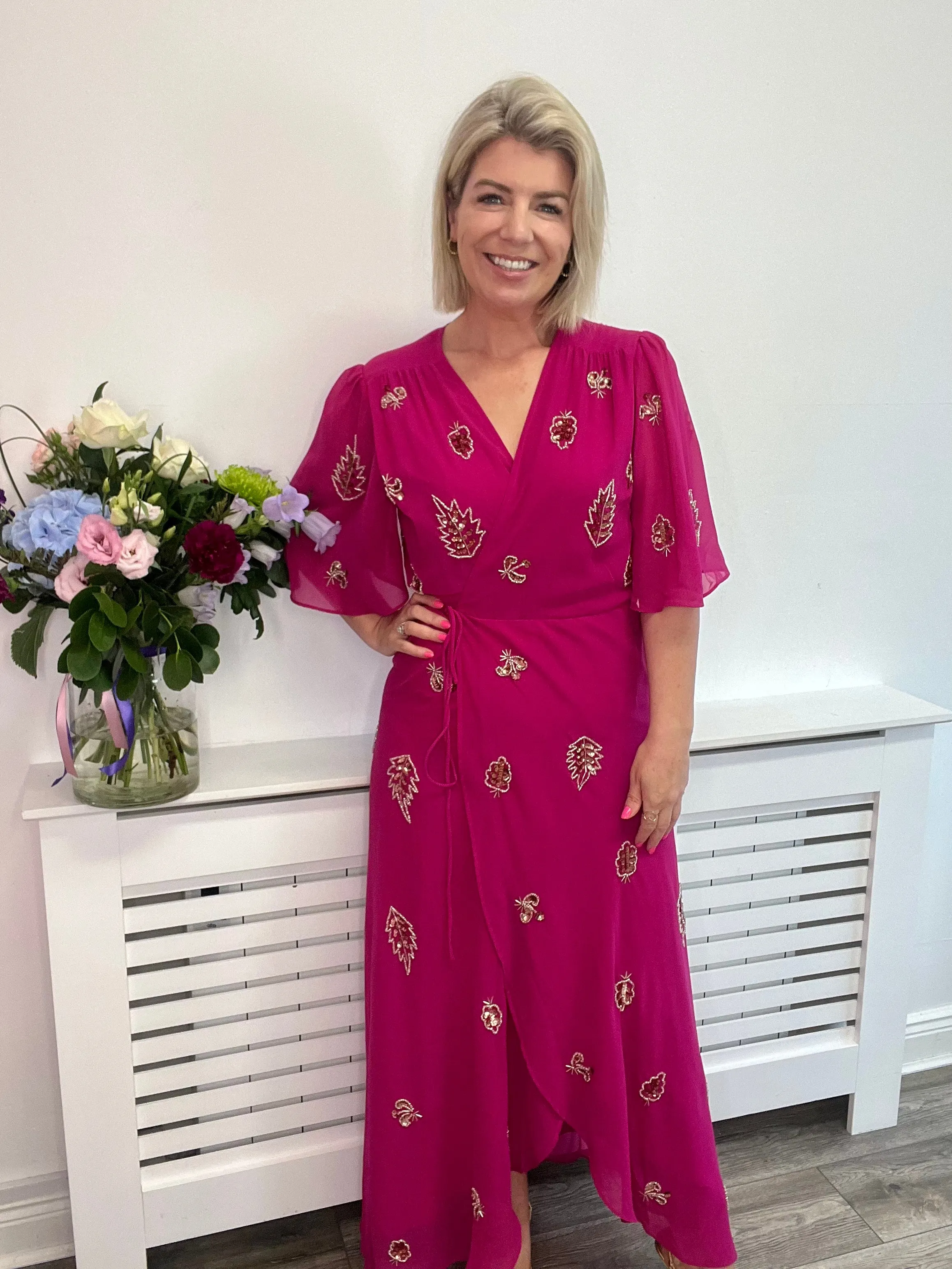 THE MOLLY EMBELLISHED FLUTTER SLEEVE WRAP DRESS (PINK)